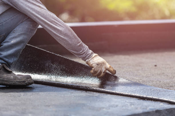 Professional Waterproofing technician working in Maybee, MI